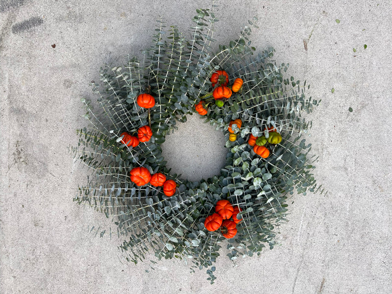 How to use and care for a fresh botanical pumpkin wreath