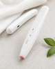 The Bite Fixer white rechargeable heat pen, front and back views
